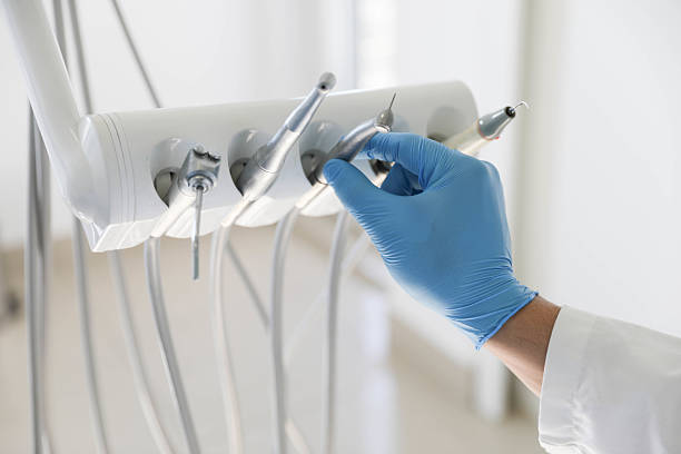 Professional Tooth Extraction technician working in Rensselaer, IN